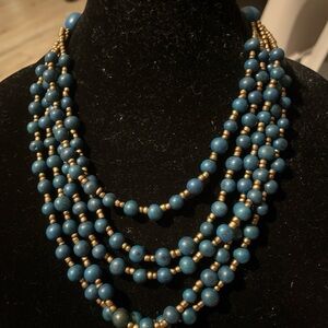 Blue and Gold Multi-Strand Necklace with Cascading Layers and bracelet